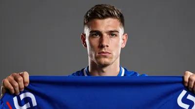 AFC Wimbledon forward Antwoine Hackford has joined Swindon Town on a two-year deal, while Swindon also secured defender...